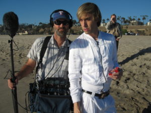 Scott Harber with Sascha Baron Cohen on the set of Borat.