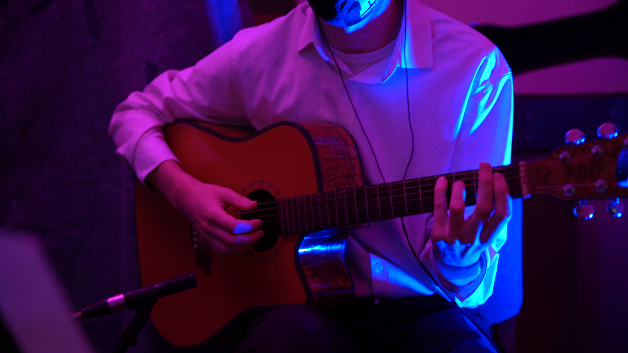 DPA 2011 Twin Diaphragm Cardioid Microphone on the acoustic guitar during the virtual Christmas at DePaul Event